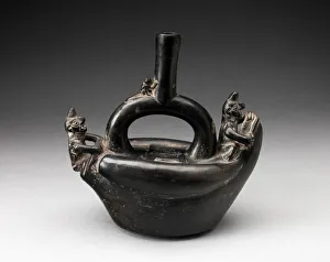 On Top Of Prints: Single Spout Blackware Vessel in the Form of Figures Riding on Reed Boat