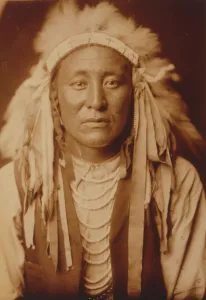North American Indian Prints: Sings in the Mountains, c1905. Creator: Edward Sheriff Curtis