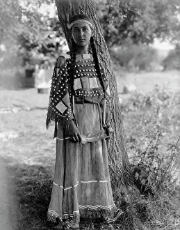Dakota Prints: Sioux maiden, c1908. Creator: Edward Sheriff Curtis