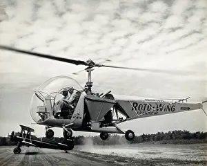 Landing Ground Prints: Sir Gordan Covell in a helicopter, Beltsville, Maryland, 1948. Creator: Unknown