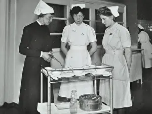 Healthcare Prints: A Sister imparts knowledge and technical expertise to two trainee nurses