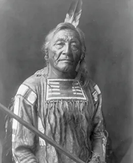 Fringes Prints: Sitting Elk-Apsaroke, c1908. Creator: Edward Sheriff Curtis