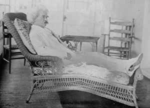 Deck Chair Prints: S.L. Clemens reclining in porch chair, 1910. Creator: Bain News Service
