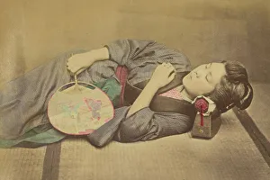 Bakumatsu Prints: Sleeping Japanese woman holding a fan, 1868-1880. Creator: Felice Beato