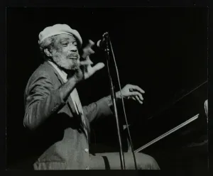 Slim Prints: Slim Gaillard on the piano at the Forum Theatre, Hatfield, Hertfordshire, 1986. Artist