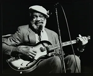 Hertfordshire Gallery: Slim Gaillard playing his guitar at the Forum Theatre, Hatfield, Hertfordshire, 13 November 1986