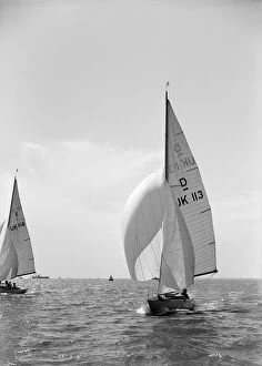 Bermuda Rig Collection: Sloop (Dragon? class) sailing with spinnaker, c1938. Creator: Kirk & Sons of Cowes