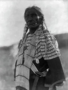 Dakota Prints: Slow Bull's wife, c1907. Creator: Edward Sheriff Curtis