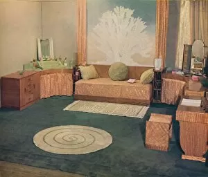 Ambrose Collection: A small bedroom, arranged by Heal & Son Ltd. of London, 1935