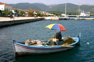 Kefalonia Prints: Small fishing boat in the harbour, Sami, Kefalonia, Greece