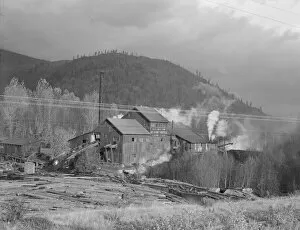 Chimneys Collection: Small private lumber mill still operating in region where large... Boundary County, Idaho, 1939