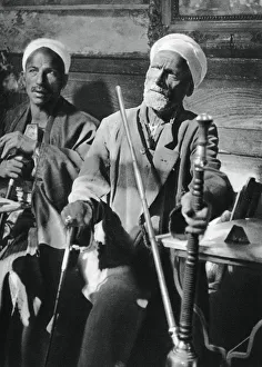 Nargileh Prints: Smoking the narghileh, Cairo, 1937. Artist: Martin Hurlimann