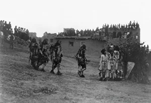Rite Prints: Snake dancers entering the plaza, c1905. Creator: Edward Sheriff Curtis