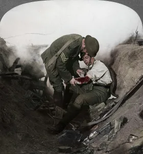 Soldier receiving first aid from a sergeant in a sap, Battle of Peronne, World War I Soldier receiving first aid from a sergeant in a sap, Battle of Peronne, World War I