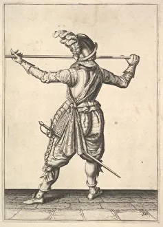 A soldier, seen from the rear, while turning to the right A soldier, seen from the rear, while turning to the right