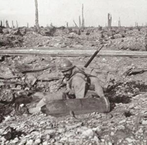 Soldier with shell, Bois d'Avocourt, Verdun, northern France, c1914-c1918