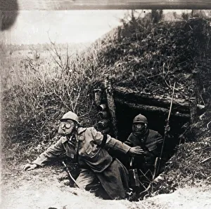 Gas Mask Prints: Soldiers in gas masks emerging from trenches, c1914-c1918
