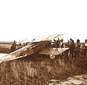 Soldiers surrounding biplane, Somme, northern France, c1914-c1918 Soldiers surrounding biplane, Somme, northern France, c1914-c1918