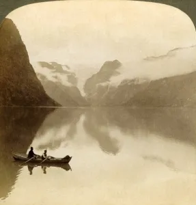 On sombre Lake Olden, between cloud-covered mountains, to Maelkevold glacier, Norway, 1905 On sombre Lake Olden, between cloud-covered mountains, to Maelkevold glacier, Norway, 1905