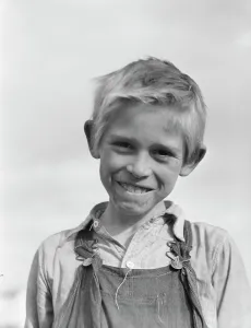 Denim Prints: Son of cotton picker living in squatters camp near Farmersville