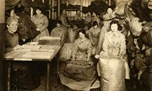 Henry Ewhite Prints: Sorting uniforms at the WaC clothing store