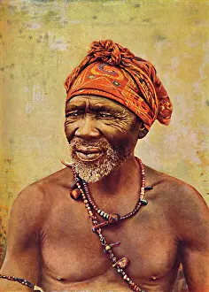 Wise Man Prints: A South African medicine man, 1912. Creator: GW Wilson and Company