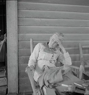 Southern lady on the veranda of the Big House at the Wray Plantation, Georgia, 1937. Creator: Dorothea Lange. Southern lady on the veranda of the Big House at the Wray Plantation, Georgia, 1937. Creator: Dorothea Lange