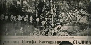 Soviet leaders visit the flower-decked bier of Stalin in Moscows Hall of Columns. Behind the chief Soviet leaders visit the flower-decked bier of Stalin in Moscows Hall of Columns. Behind the chief
