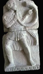 Detail from a Spanish frieze showing a man with a horn