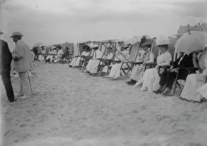 Deck Chair Prints: Spectators on beach for motor boat races, Palm Beach, 1910. Creator: Bain News Service
