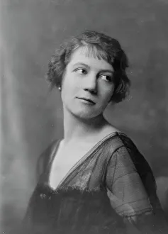 Looking Over Shoulder Prints: Spirescu, Mme. portrait photograph, 1917. Creator: Arnold Genthe