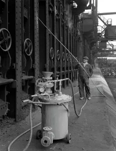Spraying Prints: Spraying the ovens at Manvers coking works near Rotherham, South Yorkshire, 1963