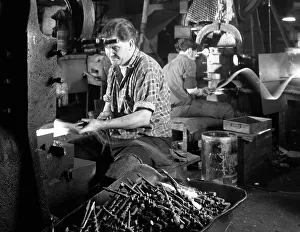 A spring hammer turning drill bits, Footprint Tools, Sheffield, South Yorkshire, 1968