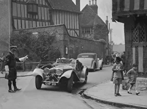 Traffic Policeman Prints: SS Jaguar 100 of SH Newsome competing in the RAC Rally, 1939. Artist: Bill Brunell