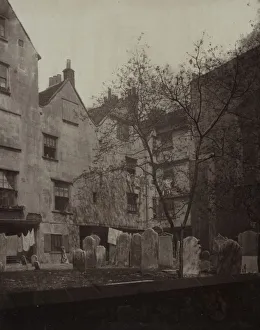 St. Bartholomews: The Churchyard Looking towards Cloth Fair, 1877. Creator: Alfred H St. Bartholomews: The Churchyard Looking towards Cloth Fair, 1877. Creator: Alfred H
