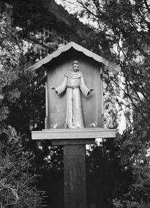 San Francesco Dassisi Prints: St. Francis statue in garden of Mrs. J.C. Brady, 1931 July 14. Creator: Arnold Genthe