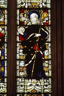 Advice Collection: St. Hilda of Whitby holding an ammonite, West window, Hereford Cathedral, 20th century