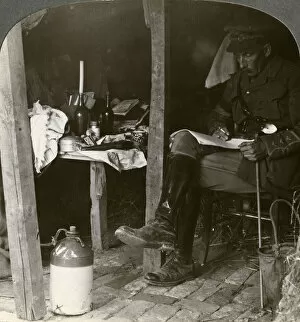 Images Dated 9th April 2009: Staff officer in a dugout studying details before an offensive, World War I