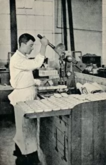Archibald Williams Gallery: Stamping Blocks of Soap, c1917