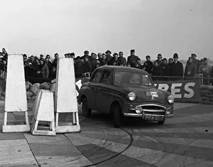 Pylon Prints: Standard 10, Jimmy Ray, winner of 1955 R. A. C. Rally. Creator: Unknown
