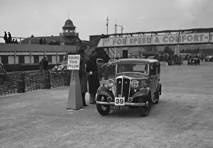 Standard Nine saloon competing in the JCC Rally, Brooklands, Surrey, 1939. Artist: Bill Brunell