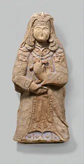 Vestments Prints: Standing Figure with Feathered Headdress, Iran, 12th-early 13th century. Creator: Unknown