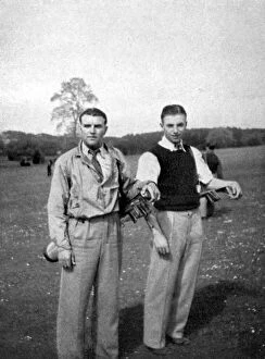 Stanley Matthews and Eddie Hapgood pause between shots during a round of golf, 1945