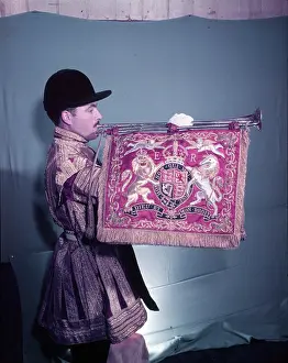 State trumpeter with ER cypher on banner, side view, London, c1953