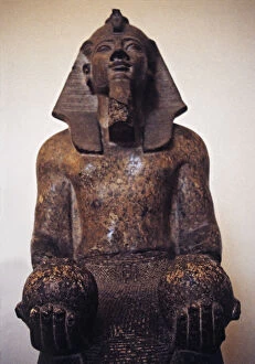Egyptian Art Gallery: Statue of Pharaoh Amenophis II or Amenhotep, of the XVIII dynasty, making an offering