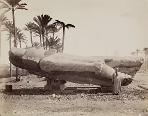 Scale Prints: Statue of Ramesses II Resting on Its Back at Memphis, 19th century. Creator: Pascal Sebah