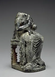 Isis Prints: Statuette of Seated Isis with Infant Harpokrates