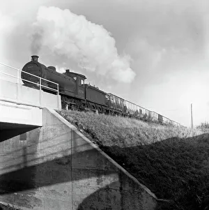 Railway Embankment Prints: Steam loco no 65794 hauling coal from Lynemouth Colliery, Northumberland, 1963. Artist