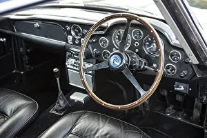 Steering wheel and dashboard of a 1965 Aston Martin DB5. Creator: Unknown