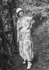 Portrait Photographs Prints: Stettheimer, Florine, Miss, standing outdoors, 1931 Aug. 19. Creator: Arnold Genthe